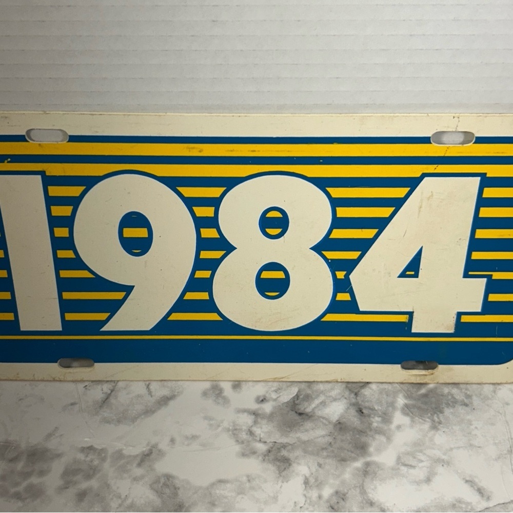 Vintage 1984 Blue and Yellow License Plate